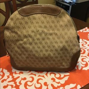 Signature DB material tan trimmed in leather.